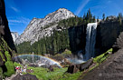 A waterfall and rainbow unite alon the Mist Trail, Yosemite National Park, California.